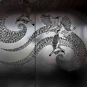 Custom bird light installation on metal doors at St Kilda Gatwick rooftop terrace project