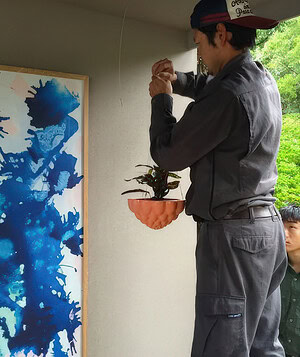 Visitors gathering for tea ceremony at We Heart Melbourne balcony garden exhibition in Nagasaki, Japan 2015